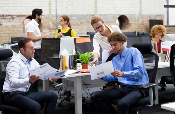 office workers discussing a plan